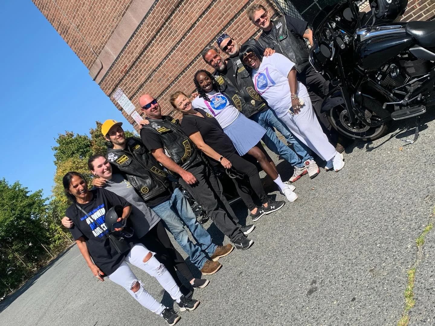 Winnin Against Addiction community members with motorcycle club partners in Boston