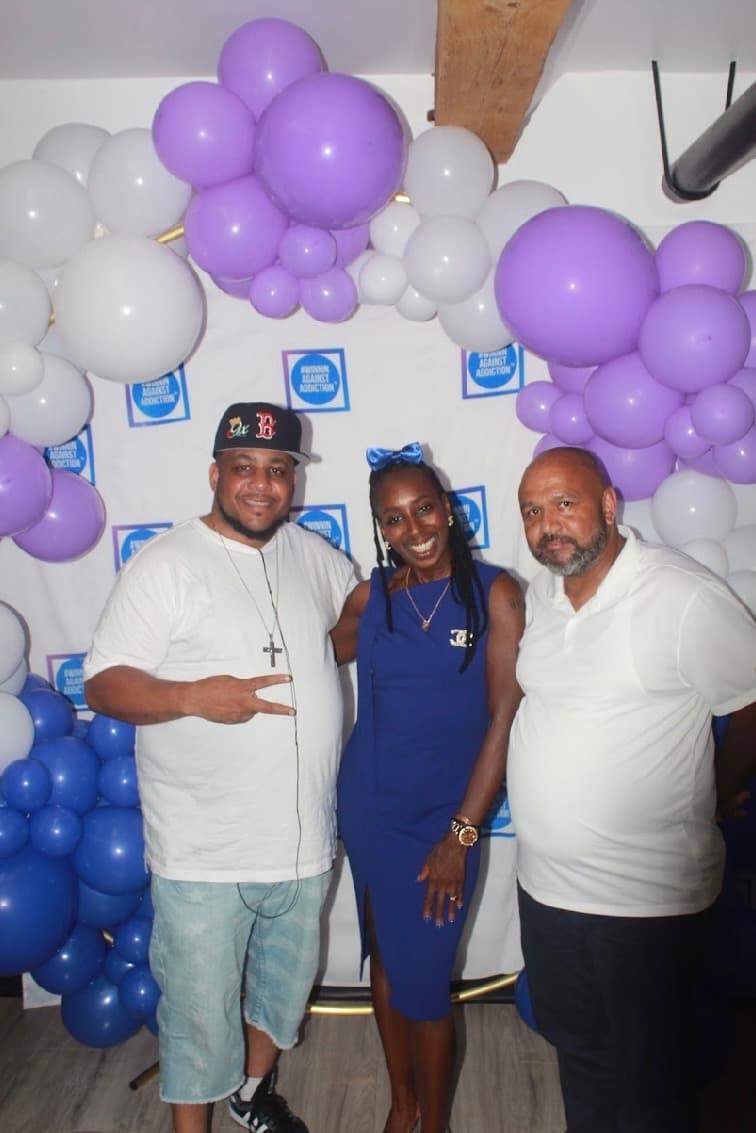 2024 supporters celebrating hope and healing at Winnin Against Addiction gala photo backdrop